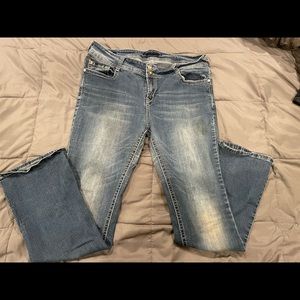 Distressed blue jeans